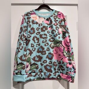 Blue and Pink Sweatshirt with Floral and Leopard Design